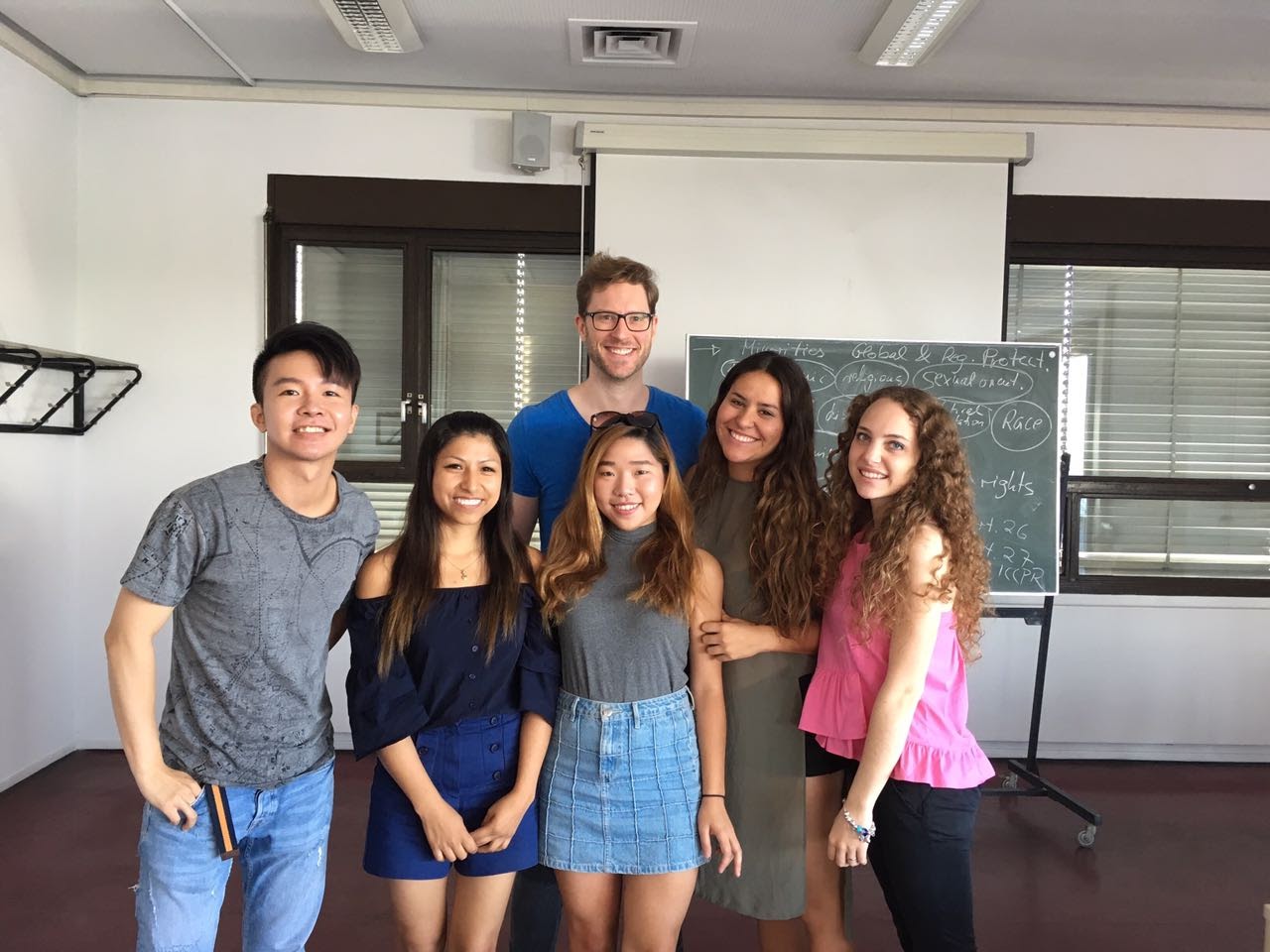 Six CGSP Students standing in a classroom